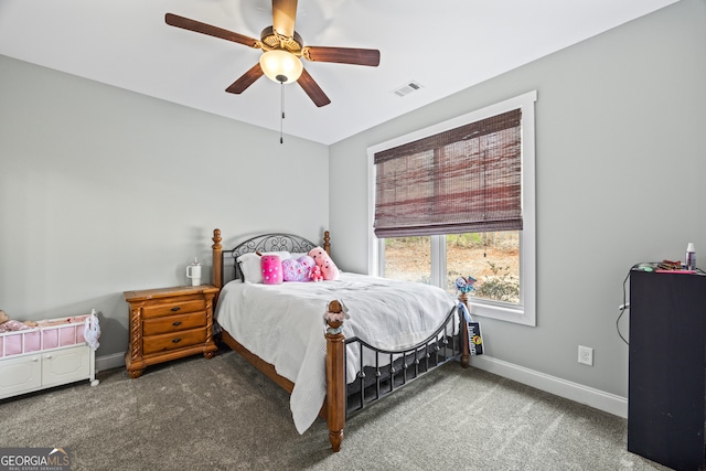 carpeted bedroom with ceiling fan