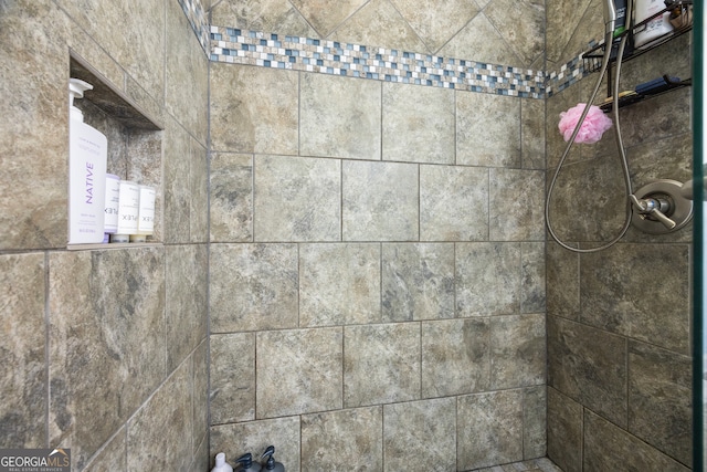 details with a tile shower