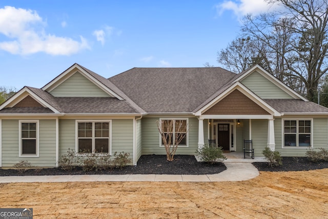 view of front of property featuring covered porch