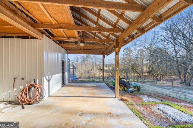 view of patio featuring ceiling fan