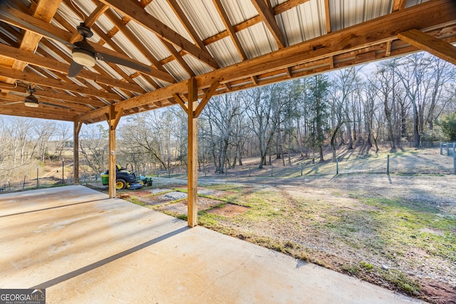 view of patio featuring ceiling fan