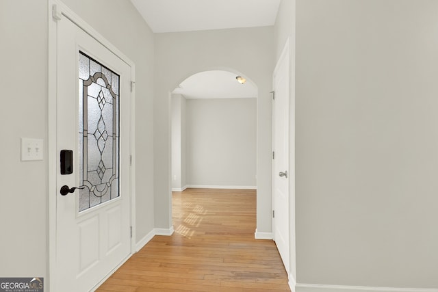 entrance foyer with light hardwood / wood-style floors