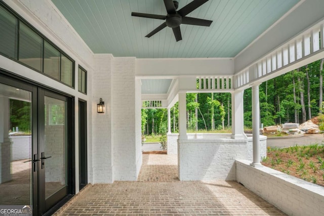 view of patio with french doors and ceiling fan