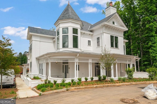 victorian-style house with a porch