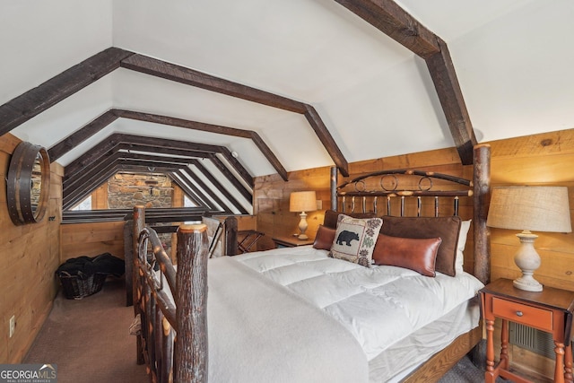 carpeted bedroom with wooden walls and lofted ceiling with beams