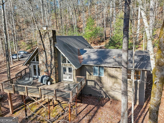 back of house featuring french doors