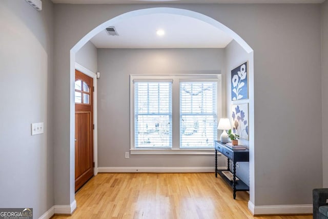 foyer with light hardwood / wood-style floors