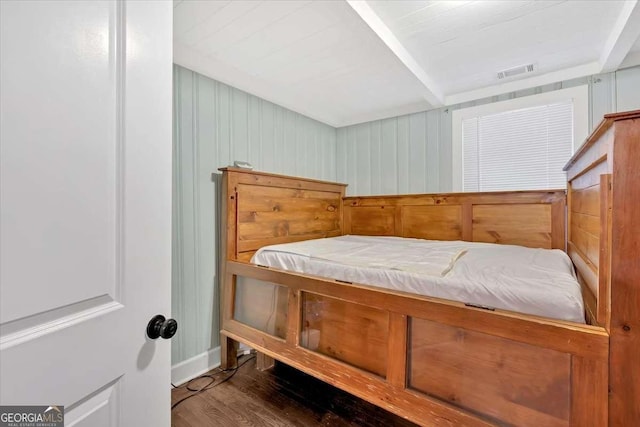 bedroom featuring dark hardwood / wood-style floors