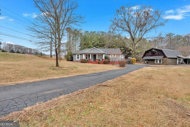 ranch-style house with a front yard