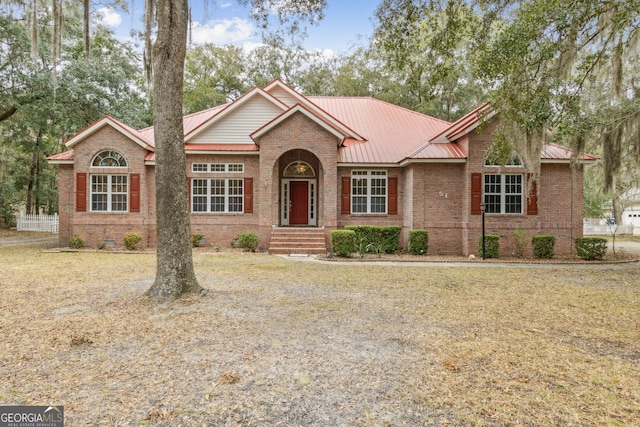 view of front of property with a front lawn