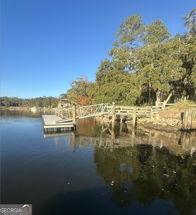 dock area featuring a water view