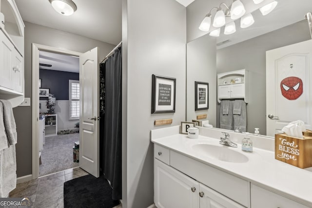 bathroom with vanity and tile patterned floors