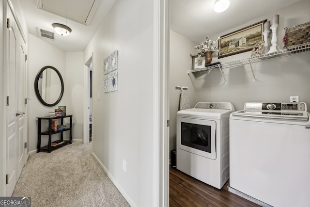 laundry room featuring separate washer and dryer