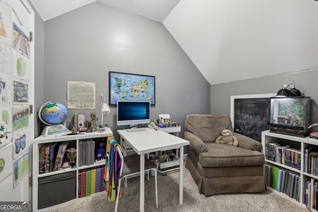 office space with vaulted ceiling and carpet