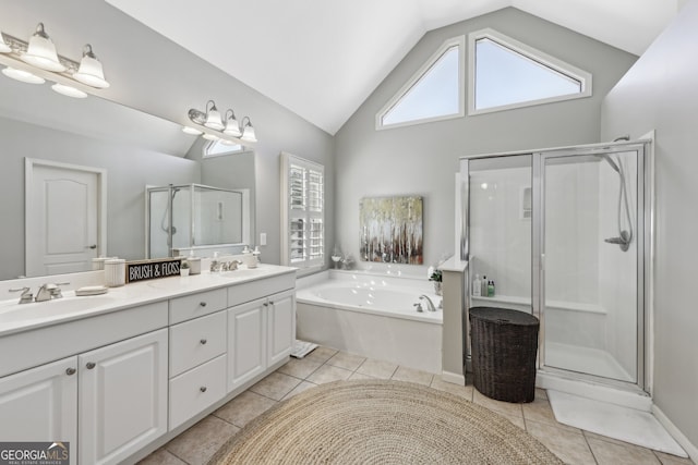 bathroom with lofted ceiling, tile patterned floors, plus walk in shower, and vanity