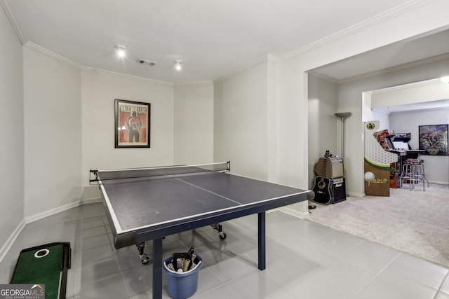 recreation room featuring crown molding and carpet