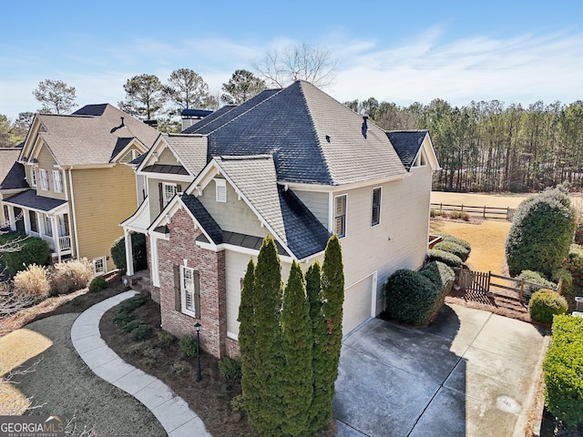 view of side of property with a garage