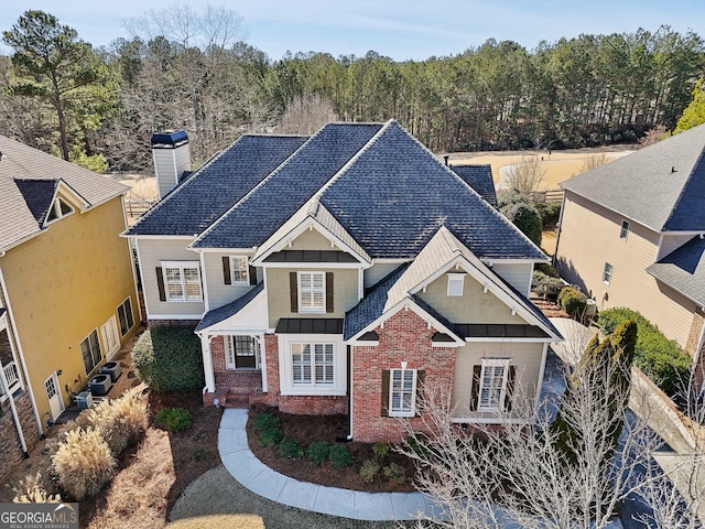 craftsman inspired home with central air condition unit