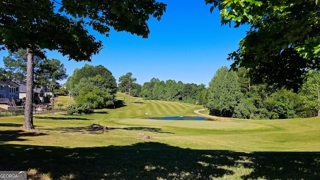 view of home's community featuring a lawn