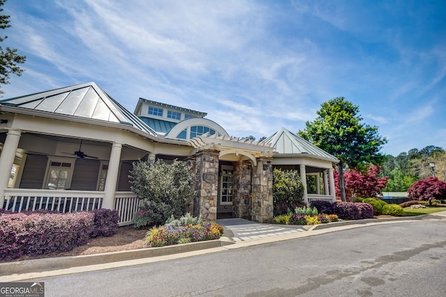 craftsman-style home featuring ceiling fan