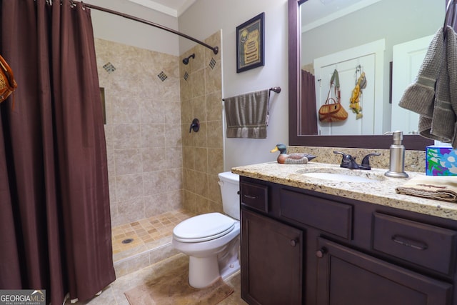 bathroom with a shower with curtain, vanity, ornamental molding, and toilet