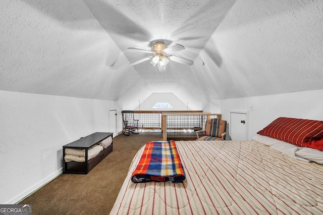 bedroom featuring dark colored carpet, lofted ceiling, and a textured ceiling