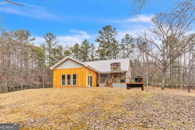 view of front of property featuring a wooden deck