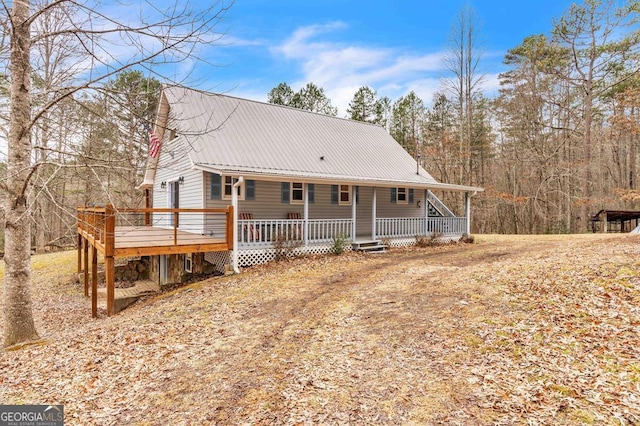 view of front facade with a porch and a deck