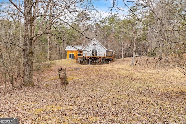 view of yard featuring a deck