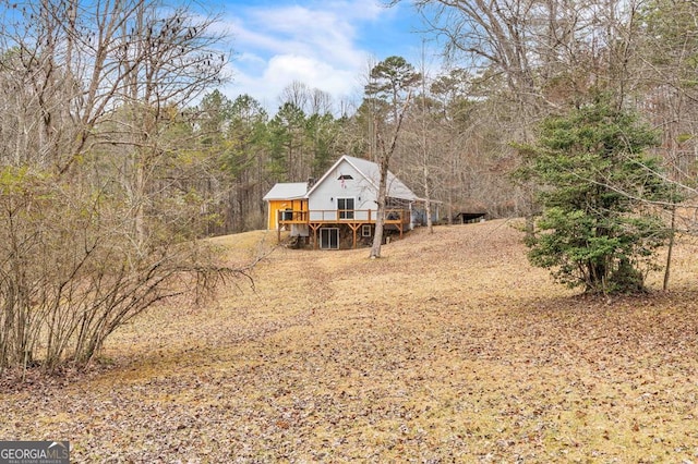 view of yard with a deck