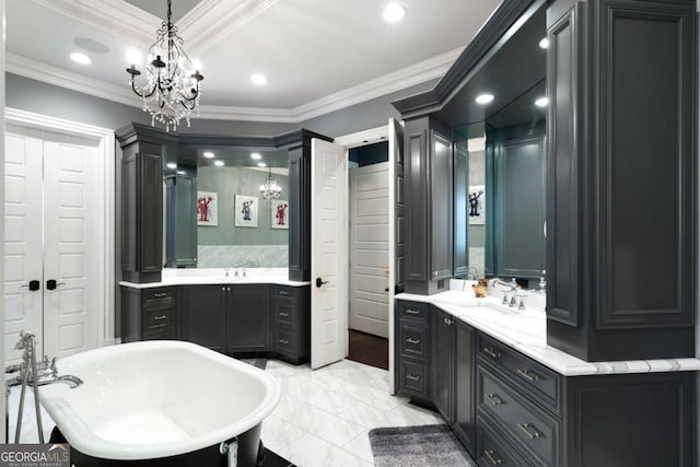 bathroom with a bathing tub, vanity, and a chandelier