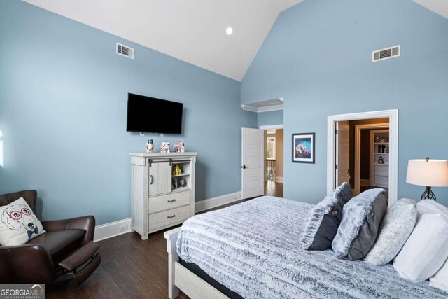 16143 Belford Dr, Alpharetta, GA 30004 - bedroom with high vaulted ceiling, baseboards, and dark wood-type flooring