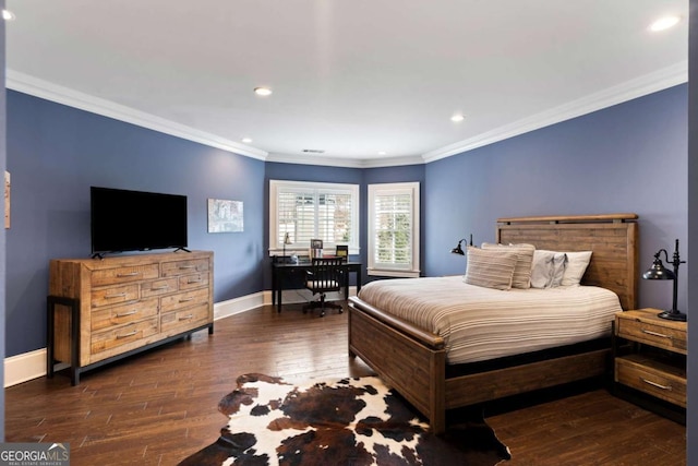 bedroom with ornamental molding and dark hardwood / wood-style floors