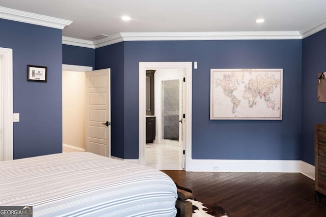 bedroom featuring wood-type flooring, ornamental molding, and ensuite bath