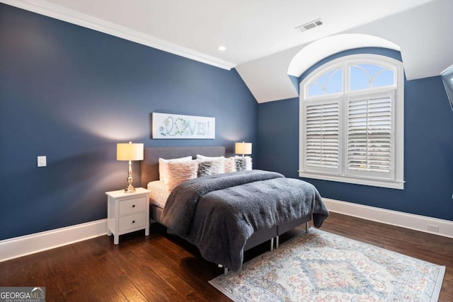 bedroom featuring lofted ceiling and dark wood-type flooring