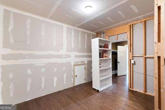 interior space with dark hardwood / wood-style flooring