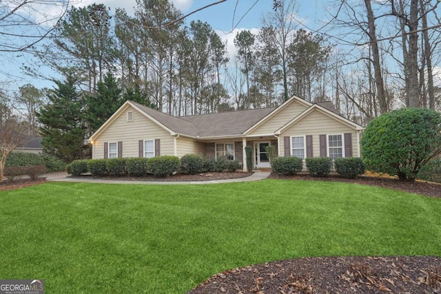 ranch-style house with a front lawn