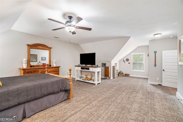 bedroom featuring lofted ceiling, carpet floors, and ceiling fan