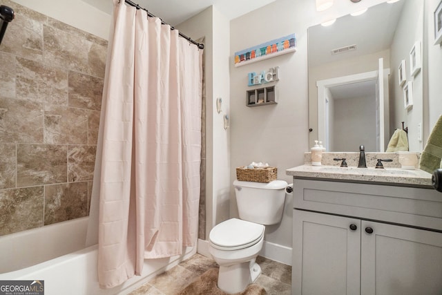 full bathroom with vanity, toilet, and shower / bath combo with shower curtain