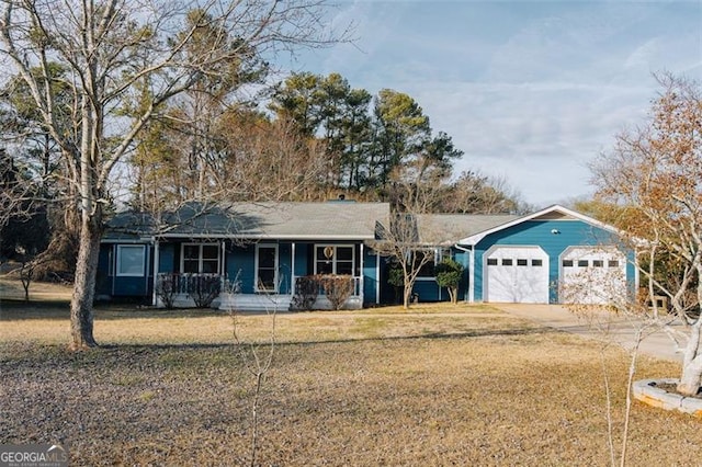 ranch-style home with a garage, a front yard, and a porch