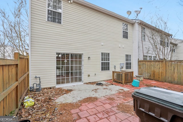 rear view of property with a patio