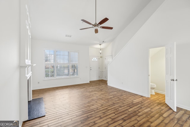 unfurnished living room featuring ceiling fan