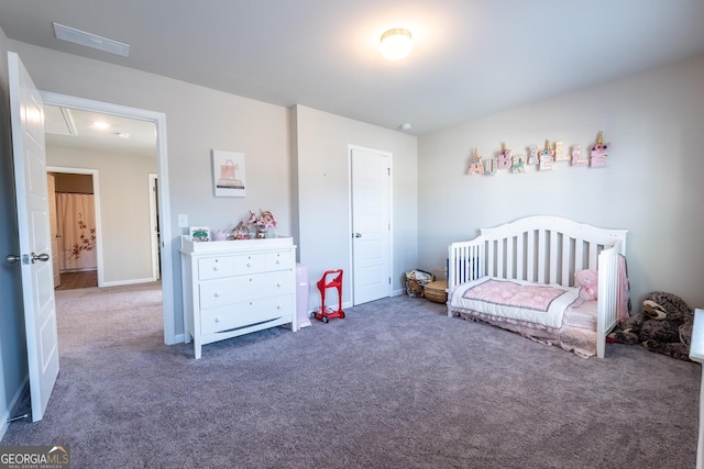 bedroom with carpet floors and visible vents