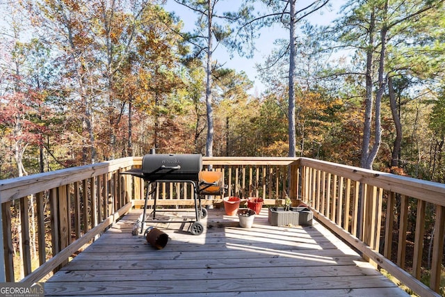 deck featuring a grill