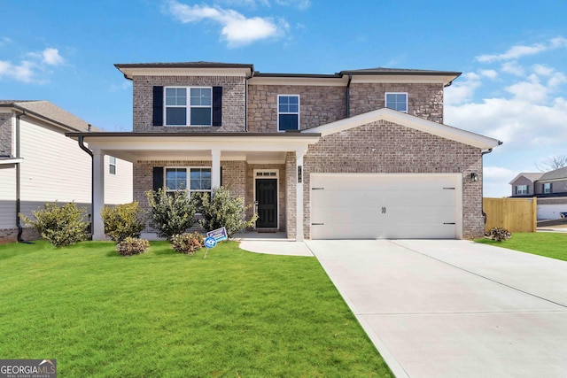 view of front of house with a garage, a front yard, concrete driveway, and brick siding