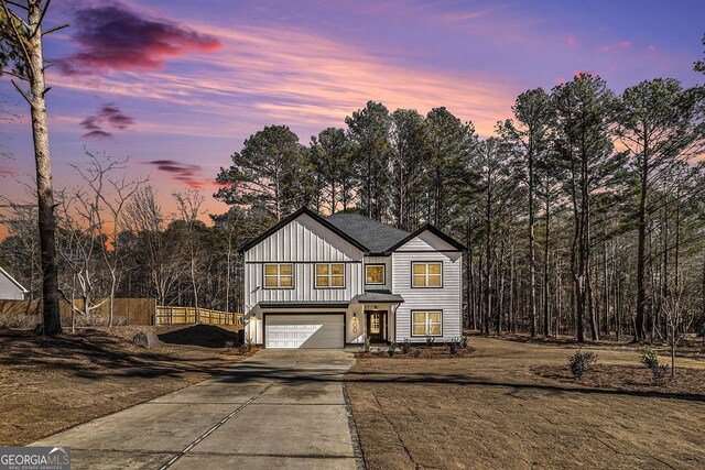 view of front of property with a garage