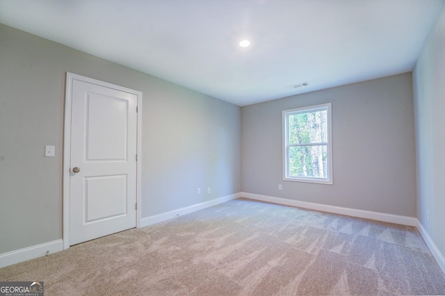 empty room with light carpet