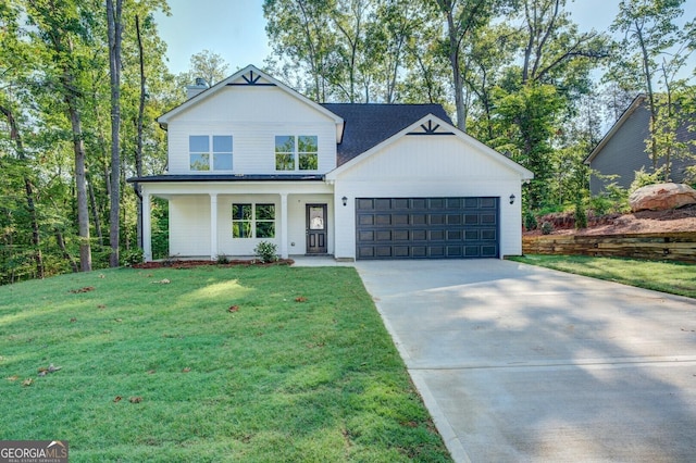 view of front facade with a garage, covered porch, and a front lawn