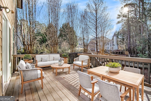 wooden deck with outdoor lounge area