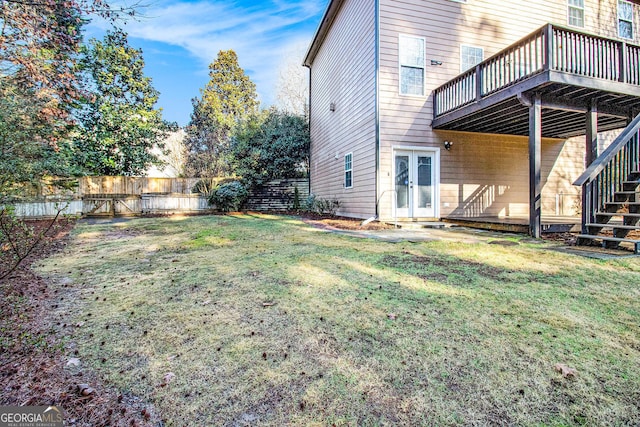 view of yard featuring french doors